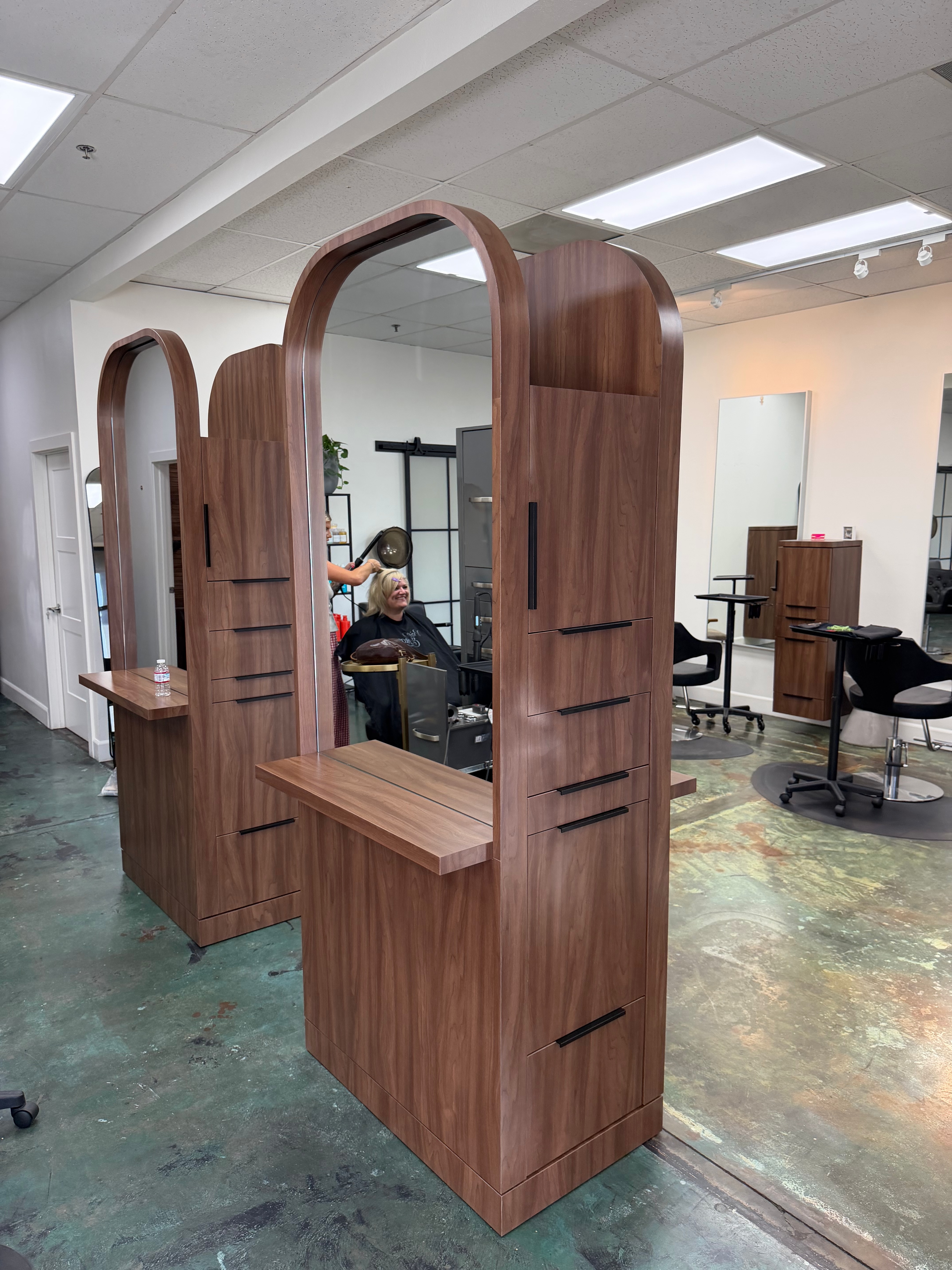 Arched wood divider styling stations