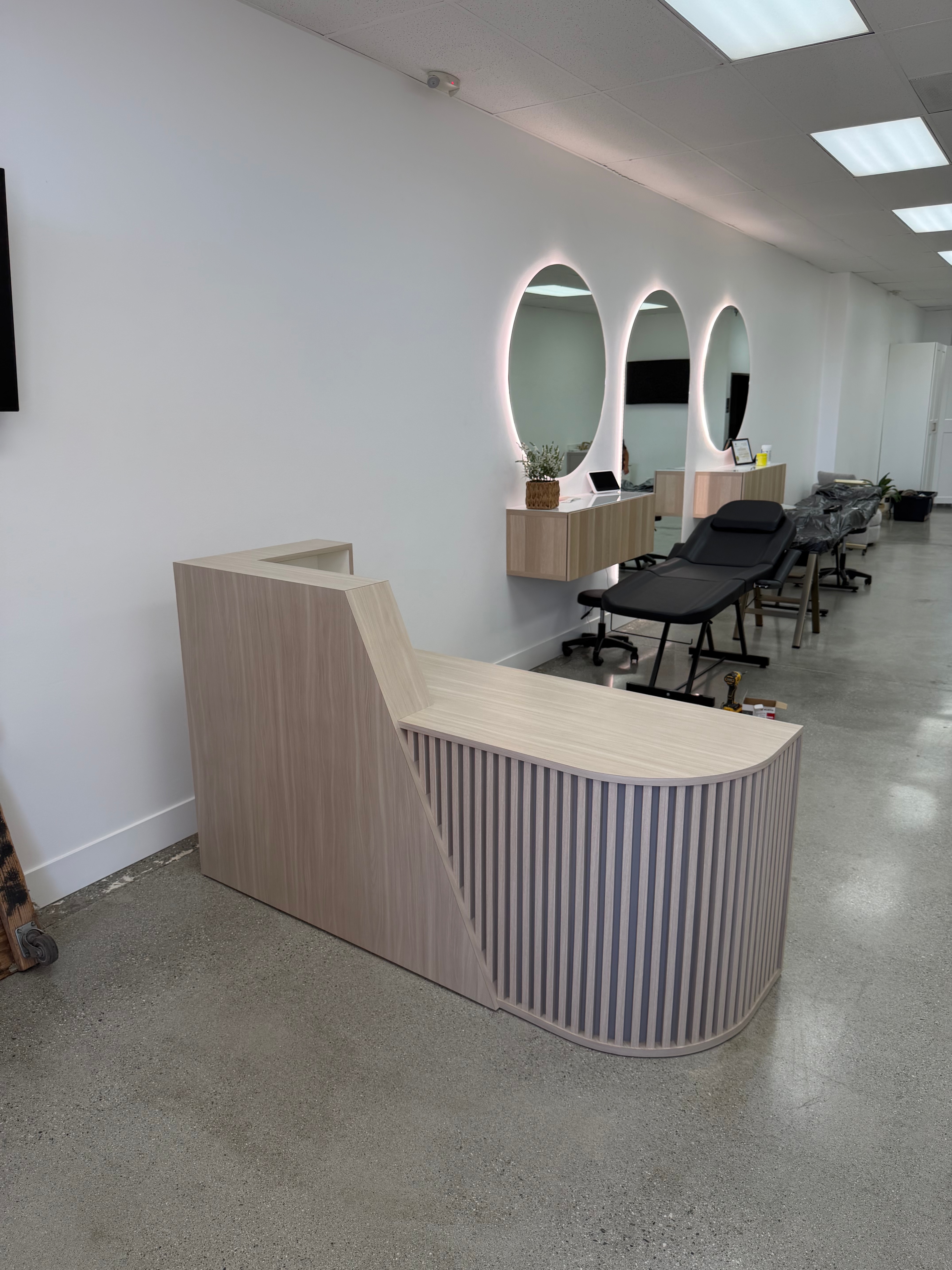 Fluted white salon reception desk